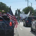 The Statue of Liberty takes a stroll through.