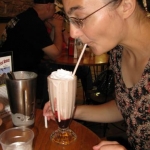 Jenni and her delicious, teeming raspberry milkshake with a layer of raspberry at the bottom!