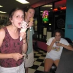 The girls throughly enjoyed their ice cream.