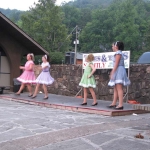 Young cloggers entertaining on the street.