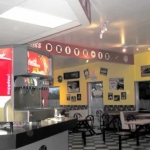 Gus's has seating inside, plus picnic tables.
