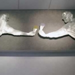 Metal people adorn the walls