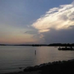The sun setting on Pewaukee Lake