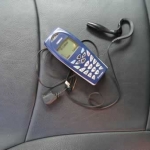 Cell Phone and Hands-Free thing - Essential, especially if the map doesn't work 