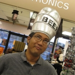 We visit a costume shop while waiting for a table. Anthony has beer on the brain. 