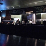 Out on a cold night for some hot pizza. Just behind that counter is the oven at Crisp Pizza Bar & Lounge. 