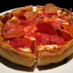 The main course, a delicious pepperoni deep dish pizza.