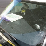 Our first order of business for the day - cleaning off 150 miles worth of bugs.