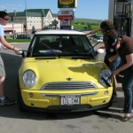 It takes three people working diligently to shine up Bessie's most important exterior bits.