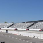 A red MINI in the lead, followed by a red MINI, and another red MINI closing in... A red MINI in the lead, followed by a red MINI, and another red MINI closing in...