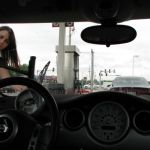 Jenny dutifully washes the bugs, salt, sand and dust off the windsheild. Jenny dutifully washes the bugs, salt, sand and dust off the windsheild.