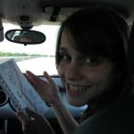 Jenny uses the triptik to figure out where we are. Jenny uses the triptik to figure out where we are.