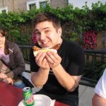 Brian is happy about his brat. Brian is happy about his brat.