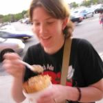 Emily moves quickly to eat her ice cream before it melts. Emily moves quickly to eat her ice cream before it melts.