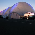 The main tent lit up at night The main tent lit up at night