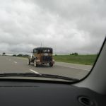 We pass about 13 old cars traveling down highway 35 in Kansas. We pass about 13 old cars traveling down highway 35 in Kansas.