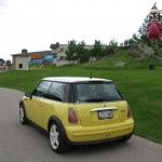 Bessie spots a giant Dino on a hillside. It's the Flintstones Bedrock City!
