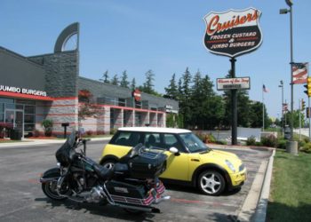 Bessie keeps company with Harleys at Cruisers in Sheboygan, Wisconsin.