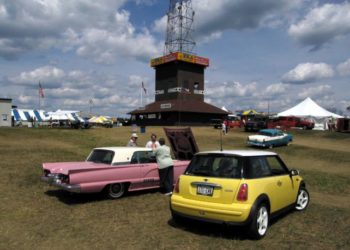 Bessie and Pop's Thunderbird in front of the Iola Tower.
