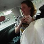 Emily, our journalist extraordinaire and Missouri hostess, getting ready for 12 hours in the backseat and she didn't mind it at all.