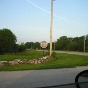A black and white stop sign left over from the days before color