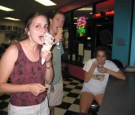 The girls throughly enjoyed their ice cream.