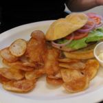 Chicken sandwich with side of chips