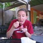Emily enjoys a her tasty combination. Emily enjoys a her tasty combination.