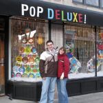 Jenny and Brian outside Pop Deluxe. Watch out! He's packing a Samurai sword umbrella!