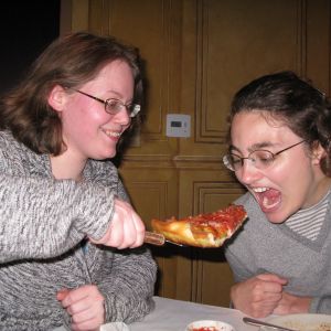 Jenni needs one last piece. Caren's skills from a month-long stint at Pizza Hut are coming in handy.