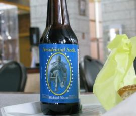 Jenny enjoyed a tall bottle of Richard Nixon. Root beer, that is. Taste all your favorite Presidents! Only in South Dakota.