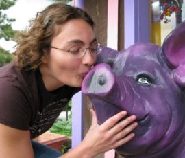 Jenni thanks the purple pig for a wonderful afternoon treat.