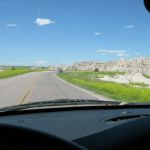 Bessie on the road through the Badlands, just enjoying the scenery. Bessie on the road through the Badlands, just enjoying the scenery.