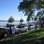 MINIs lining the lake.