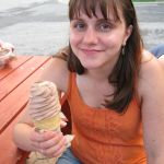 Jenny enjoys her custard.