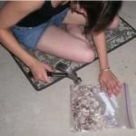 Jenny crushes the malted milk balls with vigor.